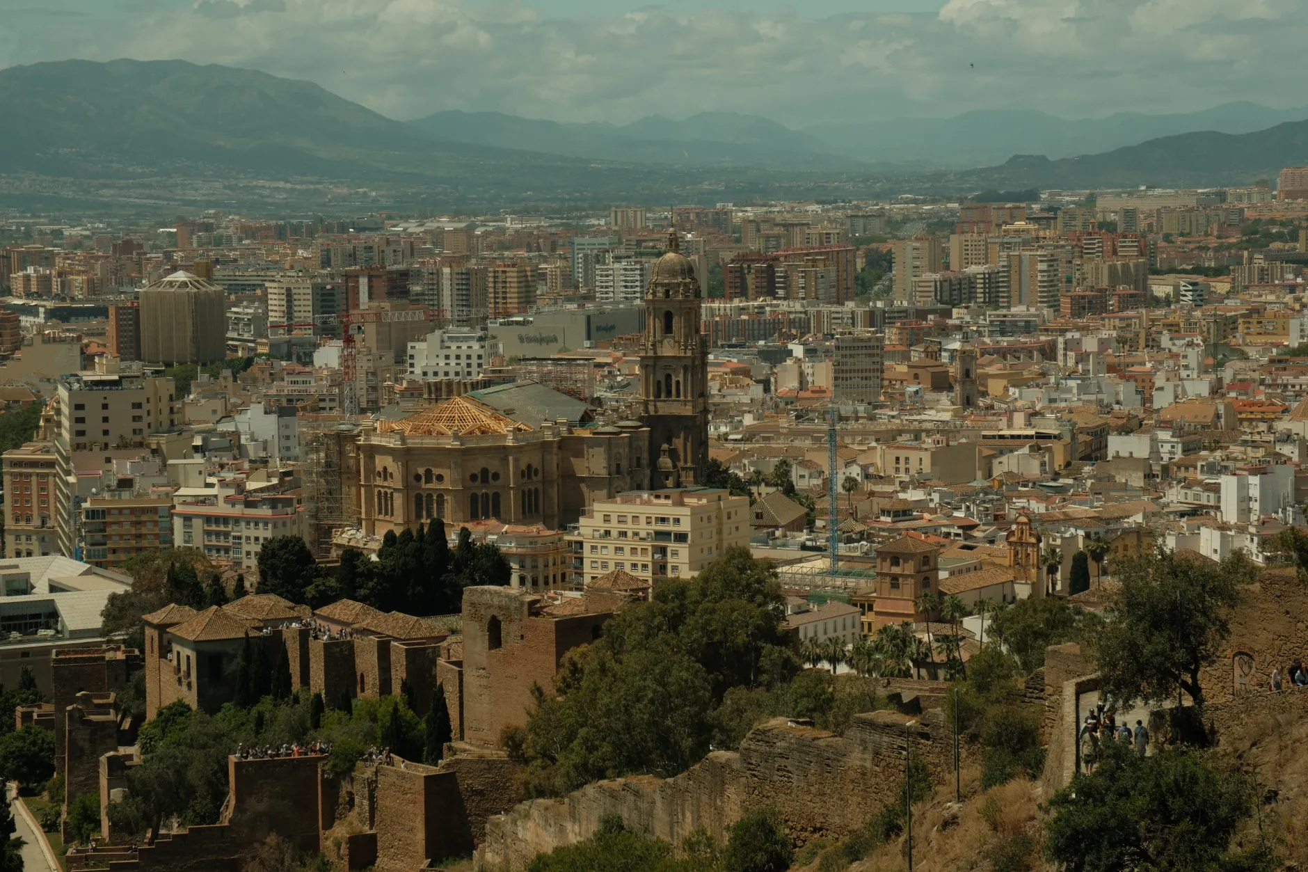 Explore the historic architecture and cityscape of Malaga, Spain.